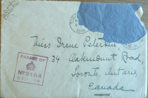 An envelope with a censor's stamp.